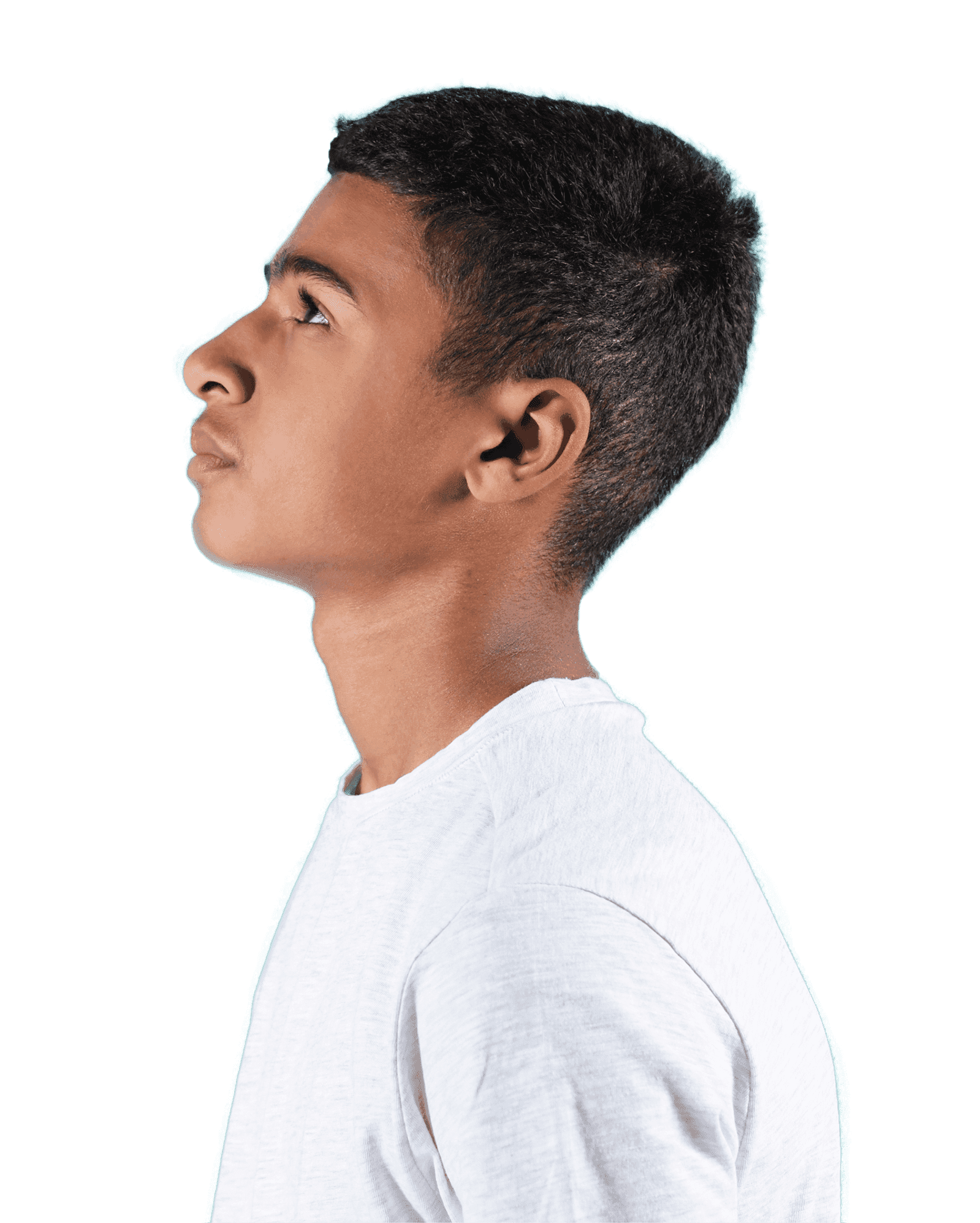 Boy in white shirt facing left and looking up